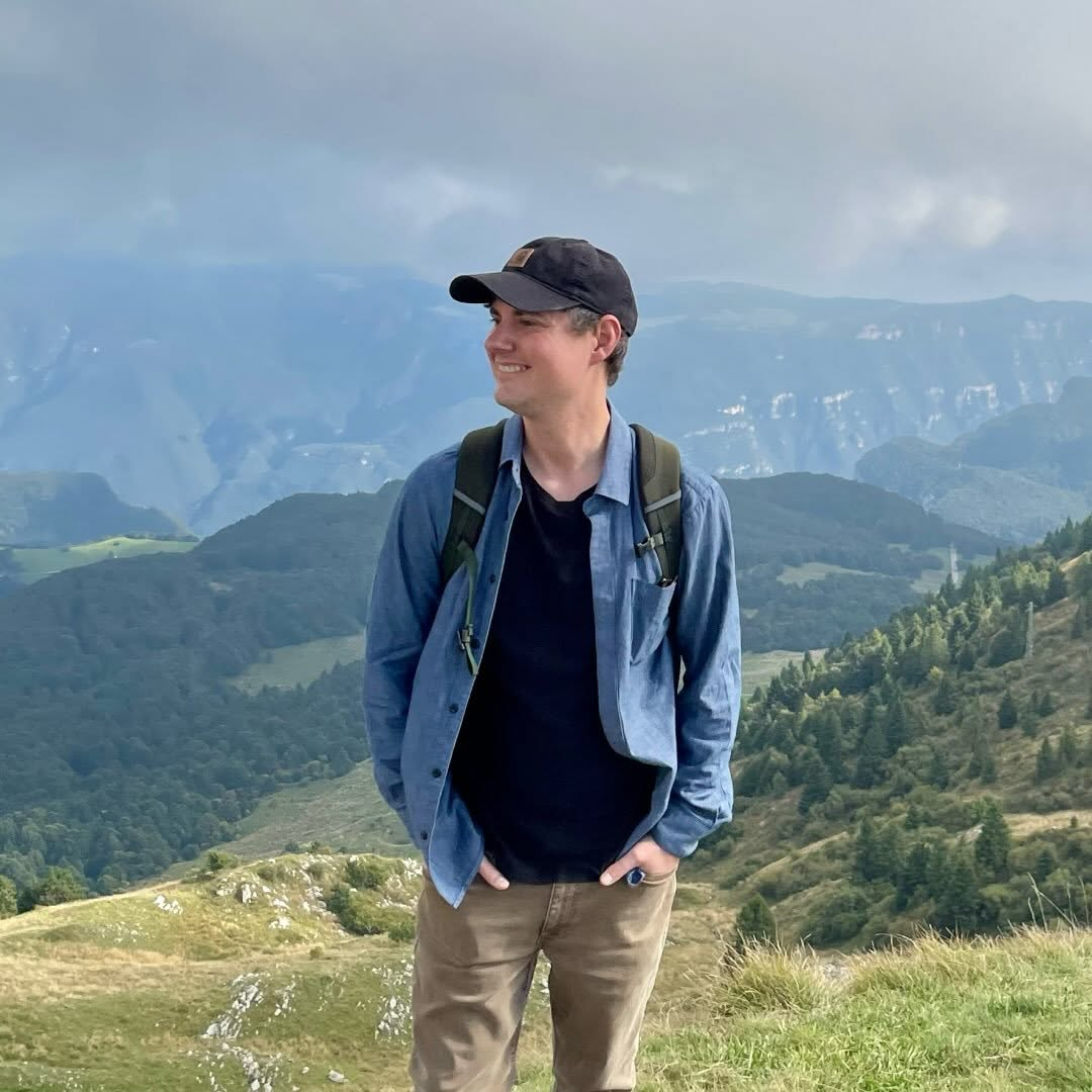 Ben Stuart standing at a mountain overlook